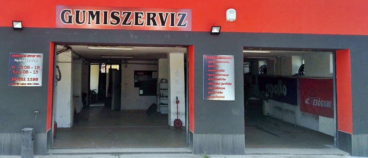 Az Abroncs Stop műhelyének homlokzata Isaszegen